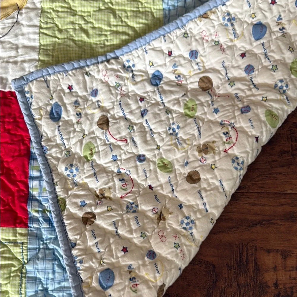 Varsity Baby Quilt with Red and Yellow Accents. Home quilted